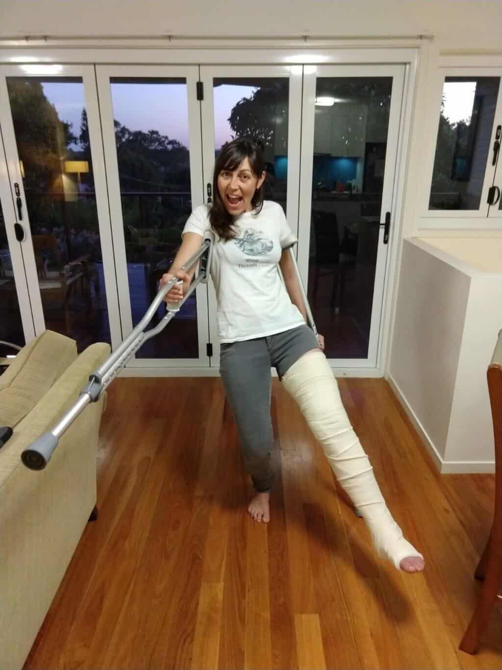 Amellia Formby dancing with her crutches and broken leg